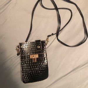 Phone and wallet cross body purse.
